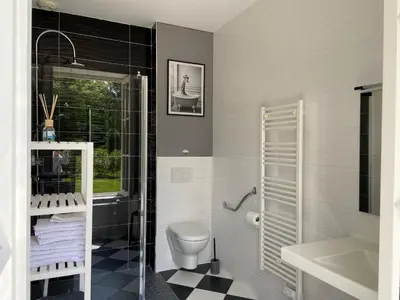 Salle de bains dans l'établissement L'Orangerie