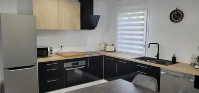 Cuisine ou kitchenette dans l'établissement Gite casson