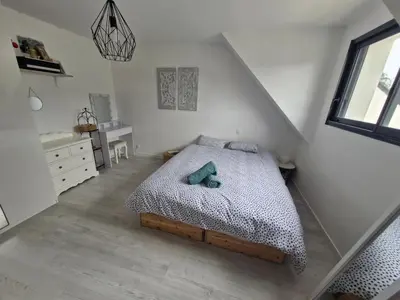 Un ou plusieurs lits dans un hébergement de l'établissement VILLA Plage&Piscine&Lac