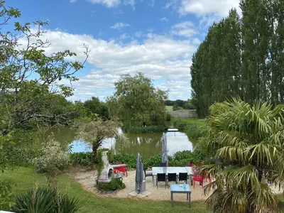 Jardin de l'établissement Chambres et tables d hôtes du Boiziller
