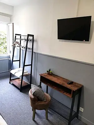 Télévision ou salle de divertissement dans l'établissement hôtel BEAUTOUR