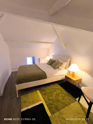 Un ou plusieurs lits dans un hébergement de l'établissement Le Gîte des Capucines - Cosy - 20mn du Parc