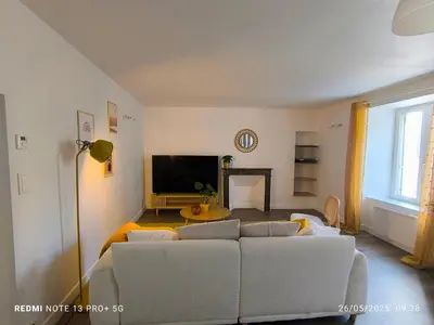 Télévision ou salle de divertissement dans l'établissement Le Gîte des Capucines - Cosy - 20mn du Parc