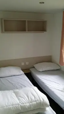 Un ou plusieurs lits dans un hébergement de l'établissement Mobilhome L'abri Côtier