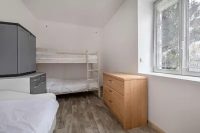 Un ou plusieurs lits dans un hébergement de l'établissement Maison pour 5 à 350m de la plage