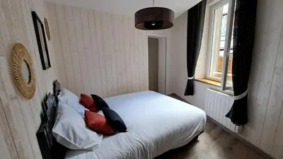 Un ou plusieurs lits dans un hébergement de l'établissement Apartment in Downtown