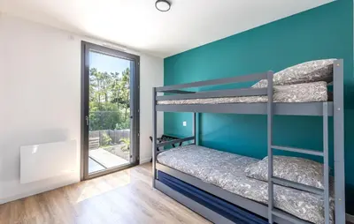Un ou plusieurs lits dans un hébergement de l'établissement Cozy Home In Saint Jean De Monts