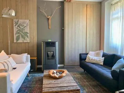 Coin salon dans l'établissement Domaine de la Beurrerie, 25