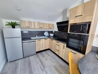 Cuisine ou kitchenette dans l'établissement Appartement 