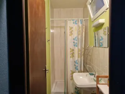 Salle de bains dans l'établissement Le Nid du Bocage