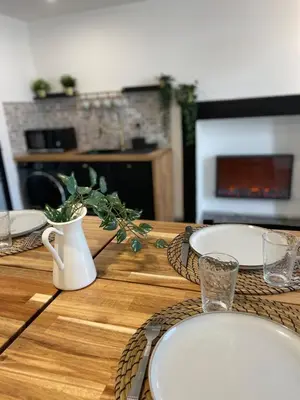 Cuisine ou kitchenette dans l'établissement Bulles & Vignes - SPA Balnéo