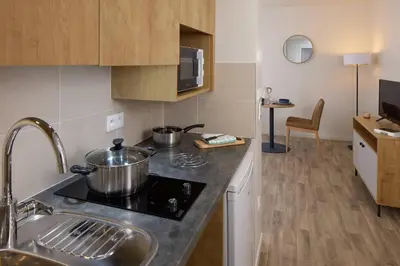 Cuisine ou kitchenette dans l'établissement Quality Aparthotel Cholet