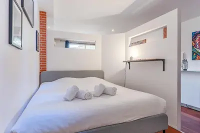 Un ou plusieurs lits dans un hébergement de l'établissement Loft Lamoricière - 15 minutes à pieds du centre