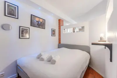 Un ou plusieurs lits dans un hébergement de l'établissement Loft Lamoricière - 15 minutes à pieds du centre