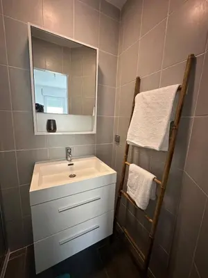 Salle de bains dans l'établissement A l'ombre du Marronnier