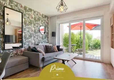 Coin salon dans l'établissement Le Retz de Jardin - Appartement calme avec parking