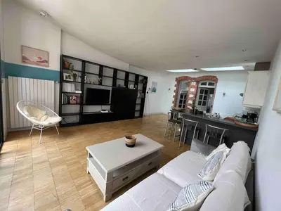 Coin salon dans l'établissement Maison Charmante - Centre de Ville - Proche gare