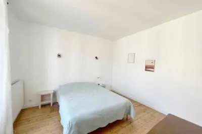 Un ou plusieurs lits dans un hébergement de l'établissement Maison Charmante - Centre de Ville - Proche gare