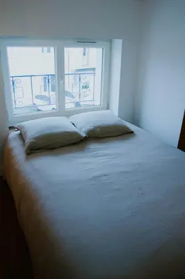 Un ou plusieurs lits dans un hébergement de l'établissement Cozy house with garden, comfort for 6 people