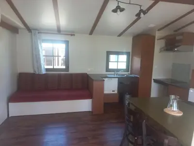 Cuisine ou kitchenette dans l'établissement Cottage adapté PMR