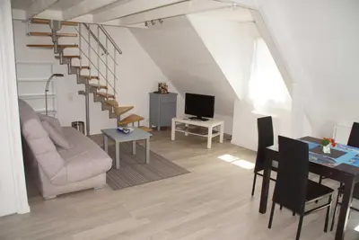 Télévision ou salle de divertissement dans l'établissement Appartement T3 à 150 m de la plage de Bonne Source