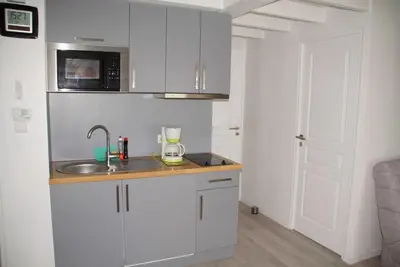 Cuisine ou kitchenette dans l'établissement Appartement T3 à 150 m de la plage de Bonne Source