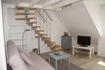 Télévision ou salle de divertissement dans l'établissement Appartement T3 à 150 m de la plage de Bonne Source