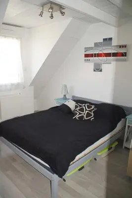 Un ou plusieurs lits dans un hébergement de l'établissement Appartement T3 à 150 m de la plage de Bonne Source
