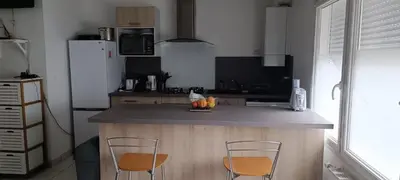Cuisine ou kitchenette dans l'établissement logement calme