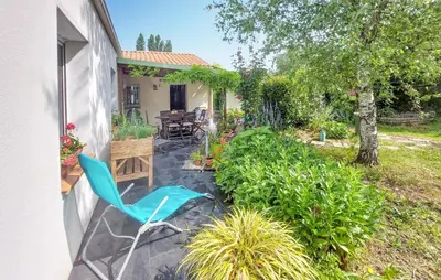 Jardin de l'établissement Charmante Maison En Vendée