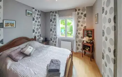 Un ou plusieurs lits dans un hébergement de l'établissement Charmante Maison En Vendée
