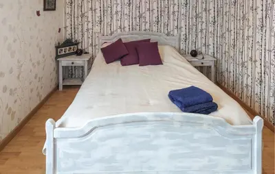 Un ou plusieurs lits dans un hébergement de l'établissement Charmante Maison En Vendée