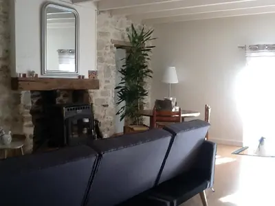 Coin salon dans l'établissement Maison de charme 18e entre mer et campagne