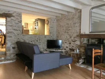Télévision ou salle de divertissement dans l'établissement Maison de charme 18e entre mer et campagne