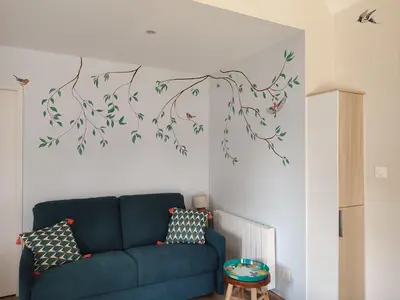 Coin salon dans l'établissement Gîte LogisNoues
