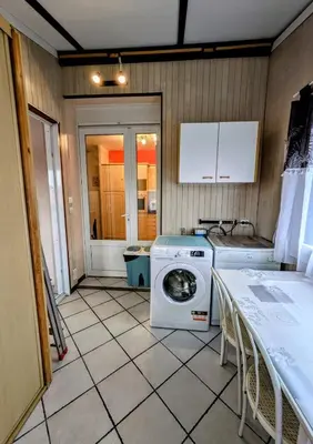 Cuisine ou kitchenette dans l'établissement Maison cozy plage & jardin