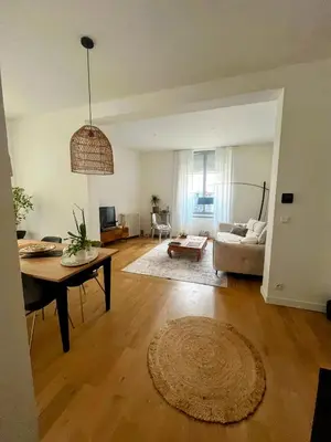 Un ou plusieurs lits dans un hébergement de l'établissement Gare - Visitation grand Appartement , 1 chambre