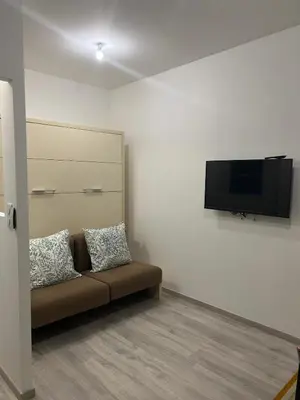 Télévision ou salle de divertissement dans l'établissement Studio cosy et indépendant - idéal pour 2 personnes