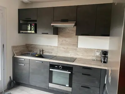 Cuisine ou kitchenette dans l'établissement Maison spacieuse et agréable à 200m de la mer