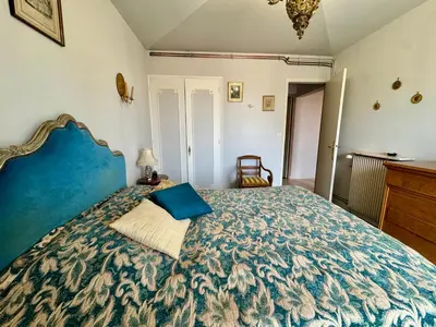 Un ou plusieurs lits dans un hébergement de l'établissement Superbe Vue Mer