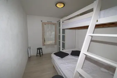 Un ou plusieurs lits dans un hébergement de l'établissement Le Bangor by TAH - Top emplacement & Parking