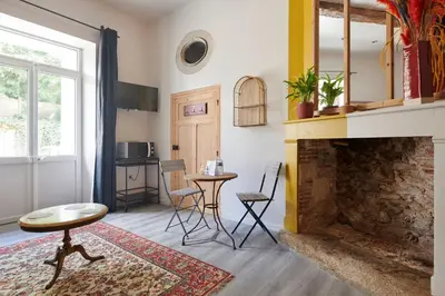 Télévision ou salle de divertissement dans l'établissement L'Oculus - Studio cosy au cœur de Clisson