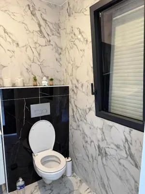 Salle de bains dans l'établissement Maison de la Pornicaise 13