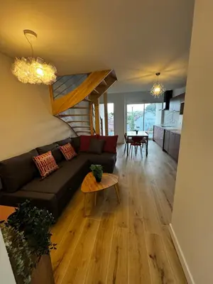 Coin salon dans l'établissement Maison pilotis 6 pers 50m mer