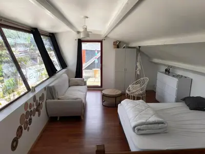 Un ou plusieurs lits dans un hébergement de l'établissement Grand appartement plein centre 4 chambres