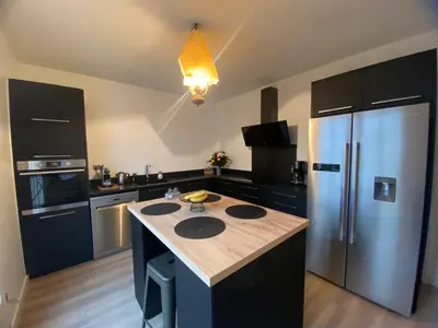 Cuisine ou kitchenette dans l'établissement Maminet