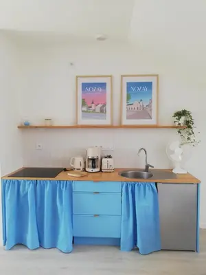 Cuisine ou kitchenette dans l'établissement La mansarde