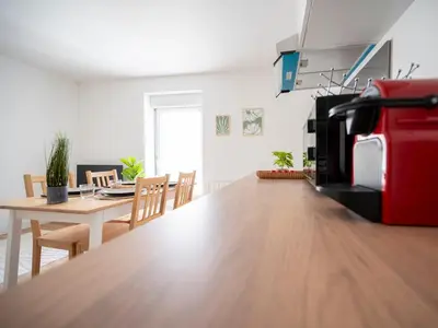 Cuisine ou kitchenette dans l'établissement Le Regard sur La Place Léger et Raffiné