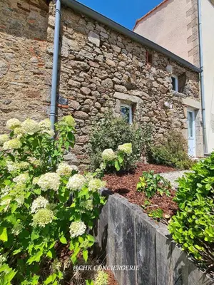Jardin de l'établissement Cottage Authentique avec Mezzanine proche du Puy duFou