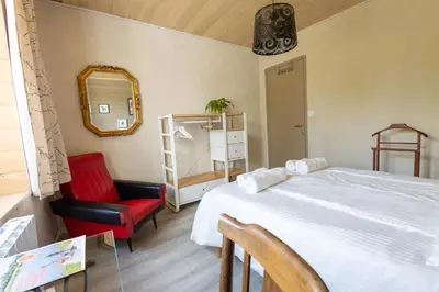 Un ou plusieurs lits dans un hébergement de l'établissement Chambres d'hôtes, table d'hôtes des Reinières proche La Loire à Vélo, 3 chambres 7 couchages